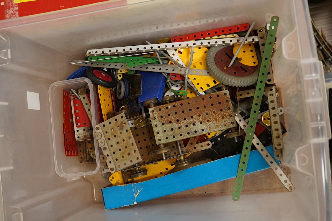 A large quantity of early Meccano construction parts, including a variety of specialist parts from the earliest sets produced and the original box for set No.3